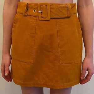 Skirt with belt buckle